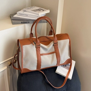 Large contrast canvas tote bag with caramel leather trim and detachable shoulder strap