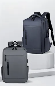 Detail view of water-resistant business backpack with side USB port and multi-pocket design