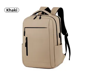 Detail view of khaki business backpack with external USB charging port and zipper pocket