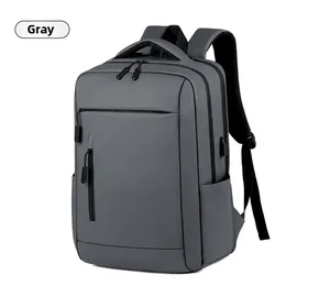 Close-up of a grey business laptop backpack featuring multi-pockets and a built-in USB port