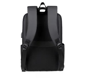 Waterproof business backpack with honeycomb mesh back panel and external USB charging port