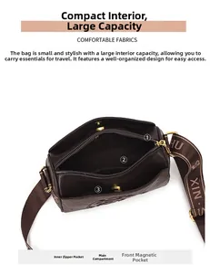 Detail view of the vintage embossed crossbody bag interior with multiple compartments