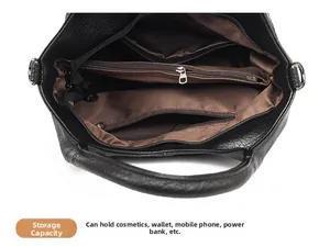 Top view detail of black pebble leather tote showing spacious multi-pocket interior storage