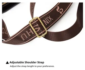 Adjustable dark brown woven shoulder strap with gold buckle for crossbody handbags