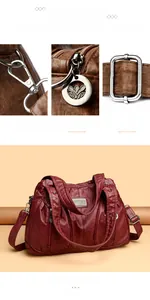 Detail view of durable metal hardware and litchi grain faux leather on vintage handbag