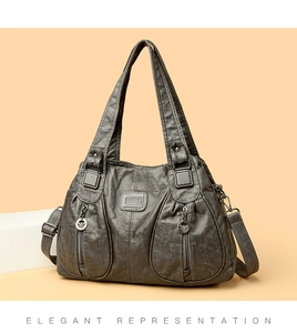 Detailed view of dark grey retro PU leather tote bag with dual decorative front pockets