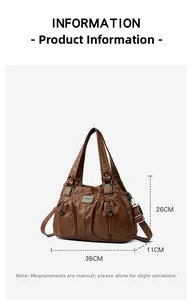 Detail of vintage brown textured PU leather bag with pleated design and metal hardware