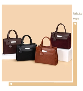 Detailed four-piece set of elegant handbags in coffee, black, caramel, and burgundy leather