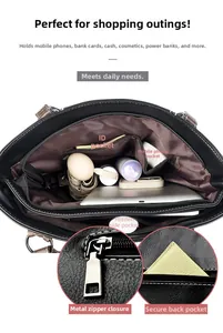 Detail view of the black tote bag interior featuring multiple functional compartments
