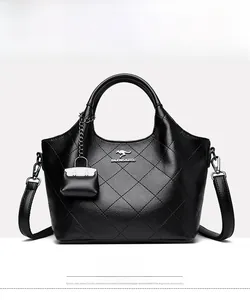 Detail of black quilted leather bucket bag with kangaroo logo and round handle