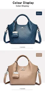 Close-up of quilted leather bucket bags in blue and khaki with kangaroo logo and chain details