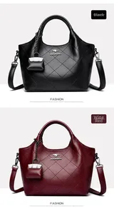 Detail view of black and burgundy vintage bucket bags with quilted patterns and mini charms