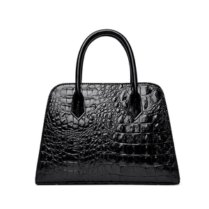 Structured black crocodile embossed tote bag with double top handles and glossy finish