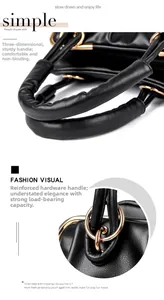 Detail of reinforced handles and metal hardware on a black leather crossbody bag
