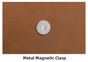 Macro shot of silver magnetic clasp with grid pattern on brown leather bag