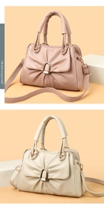 Detail view of pink and beige pleated handbags with gold buckles on geometric stands