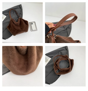 Detail view of brown faux fur tote bag showing soft texture and leather shoulder strap