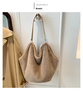Detailed view of plush brown faux fur tote bag with smooth texture and leather strap