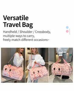 Detail of pink strawberry travel bag showing waterproof fabric and multiple pockets