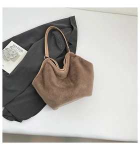 Macro shot of fluffy brown leopard print tote bag with premium leather handles