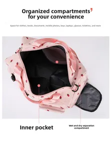 Detail view of pink travel bag interior with dry wet separation pocket and inner compartments