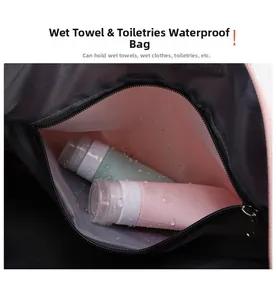 Detail of waterproof travel bag with pink inner lining showing wet and dry separation