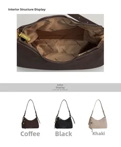 Detail view of the interior lining and zip pocket of a vintage leather hobo bag