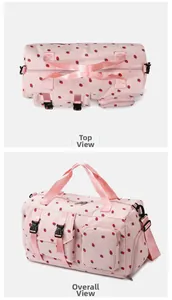 Top and side views of pink strawberry print corduroy travel bag with straps