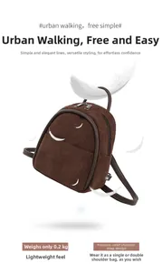 Detail of a lightweight brown corduroy mini backpack weighing 0.2kg with decompression straps