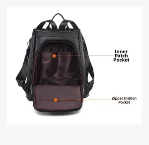 Detail view showing internal pockets and zippered compartment of the black leather backpack