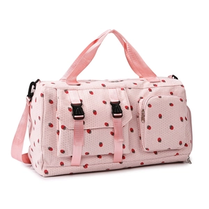 Pink strawberry print large travel duffel bag with front pockets and shoulder strap