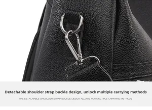 Detail of silver detachable strap buckle on black litchi pattern leather backpack
