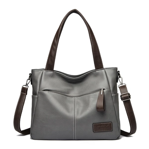 Fashionable dark grey large capacity tote bag with brown straps and silver hardware detail