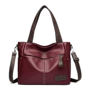 Classic burgundy tote bag with contrast stitching and adjustable shoulder strap for women