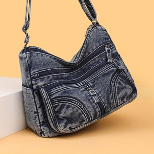 Borsa a tracolla in denim lavato retrò con tasche multiple a cerniera su fondo giallo