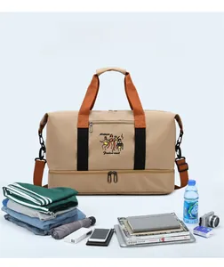 Detail view of khaki travel bag with separate bottom compartment for shoes and gear