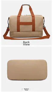 Detail view of khaki canvas travel bag showing back reinforced webbing and flat bottom