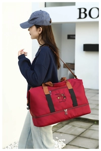 Red large capacity travel duffel bag with separate bottom shoe compartment and embroidery