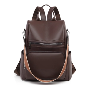 Dark brown PU leather anti-theft backpack for women with woven strap and荔枝 texture