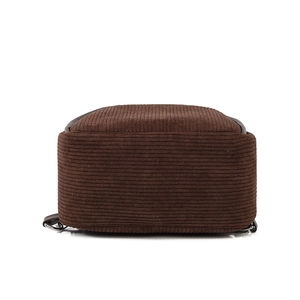 Brown corduroy fashion backpack showing detailed texture and silver metal bottom hardware