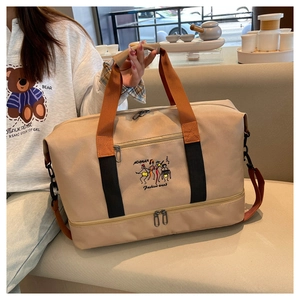 Close-up of beige travel bag showing embroidered logo and waterproof nylon texture