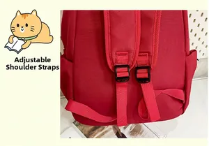Detail of adjustable padded shoulder straps on a durable deep red travel backpack