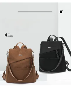Detail of brown and black corduroy anti-theft backpacks with diagonal front pockets