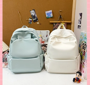 Detail of waterproof backpacks with large capacity and gothic letter embossed pattern