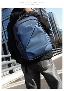 Détail du tissu imperméable d'un sac à dos d'affaires avec poche avant zippée en diagonale