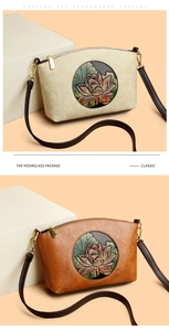 Detail view of two vintage shell bags with embossed lotus floral patterns and gold zippers