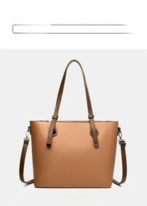 Vue de face du sac cabas jaune marron en cuir grainé avec bandoulière amovible