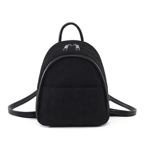 Mini black corduroy backpack with leather trim and metallic zipper for daily commute