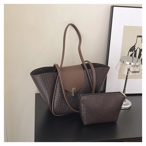 Detail of dark coffee woven texture PU leather tote set with magnetic flap closure