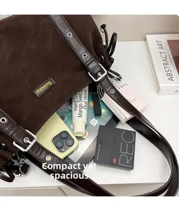 Interior view showing the large capacity of this dark brown vintage boston bag
